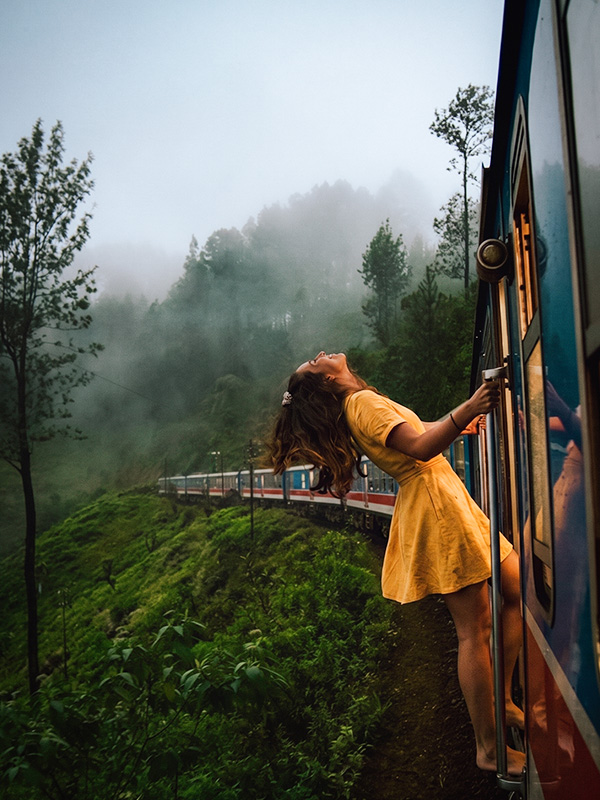 Sri Lanka tea country railway crossing lush misty hills